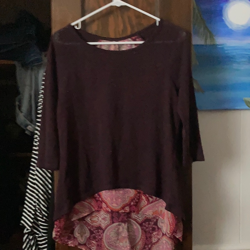 Purple shirt with mesh material underneath